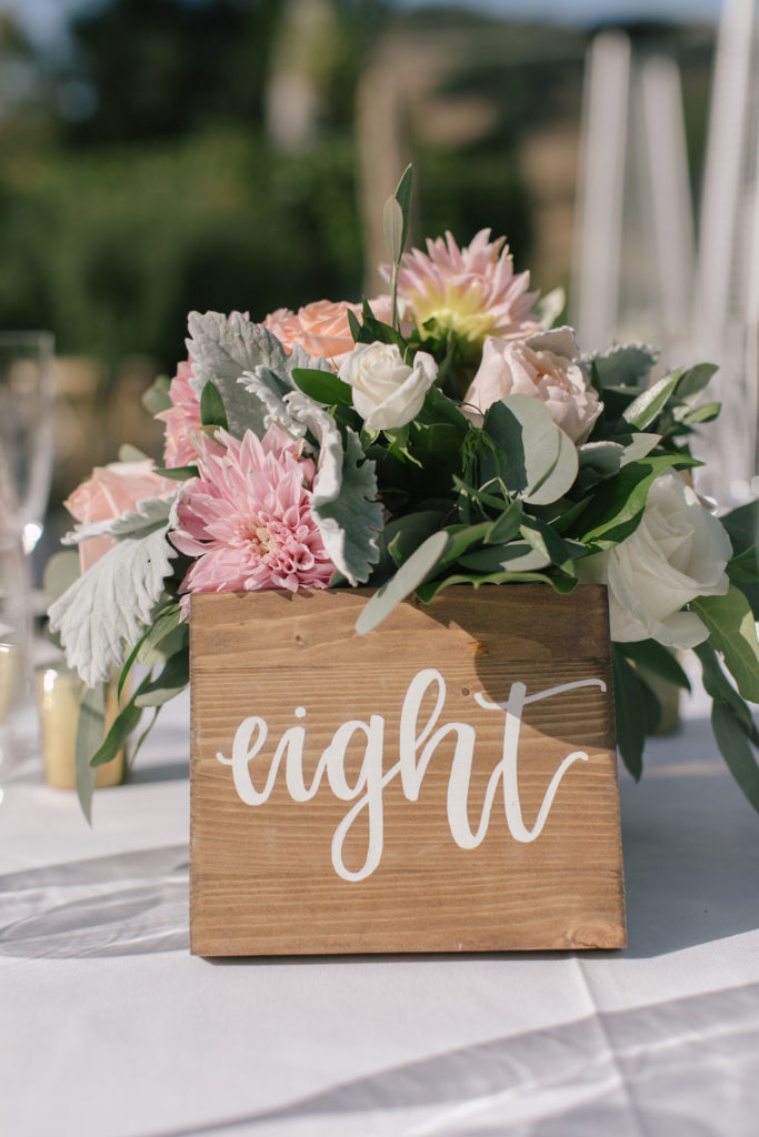 Wedding flower centerpieces and wooden table number
