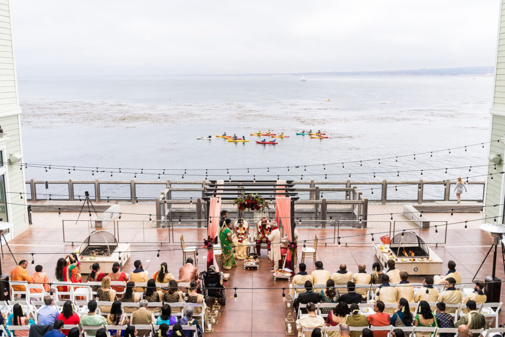 Modern indian wedding with mandap set in front of a ocean view in Monterey CA