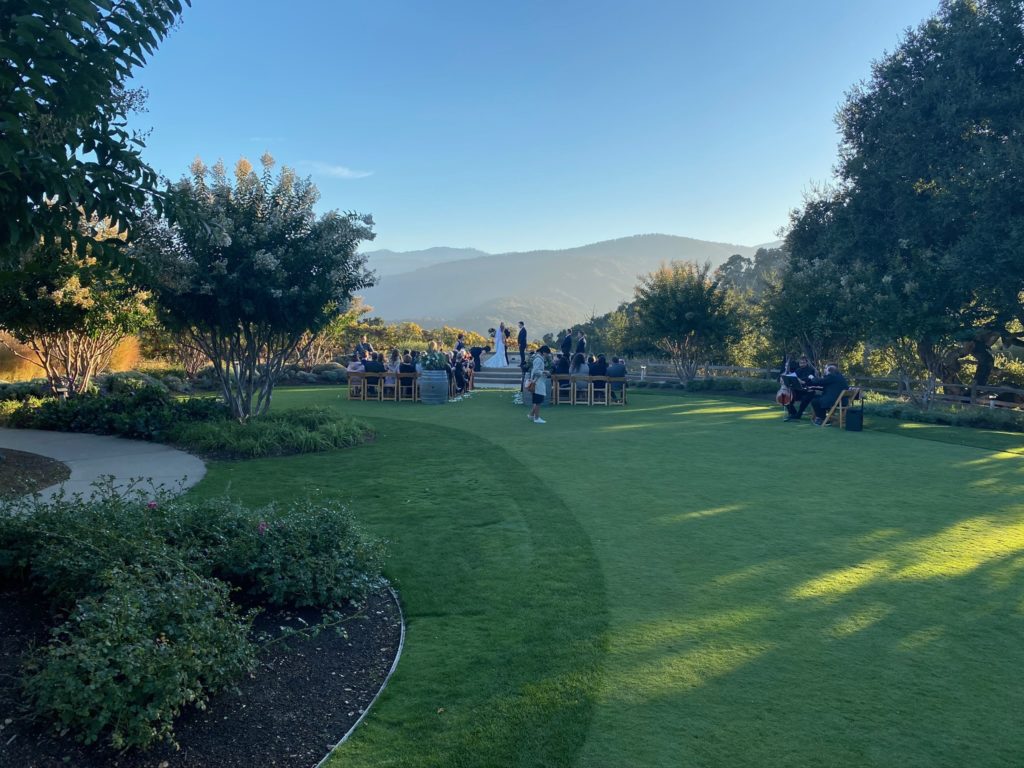 Wedding ceremony taking place at Holman Ranch wedding venue in Carmel California