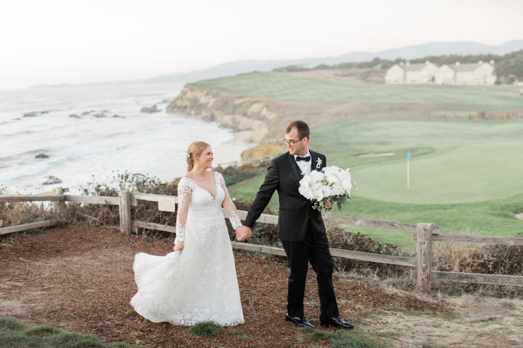 Bride and Groom on Golf Course overlooking water